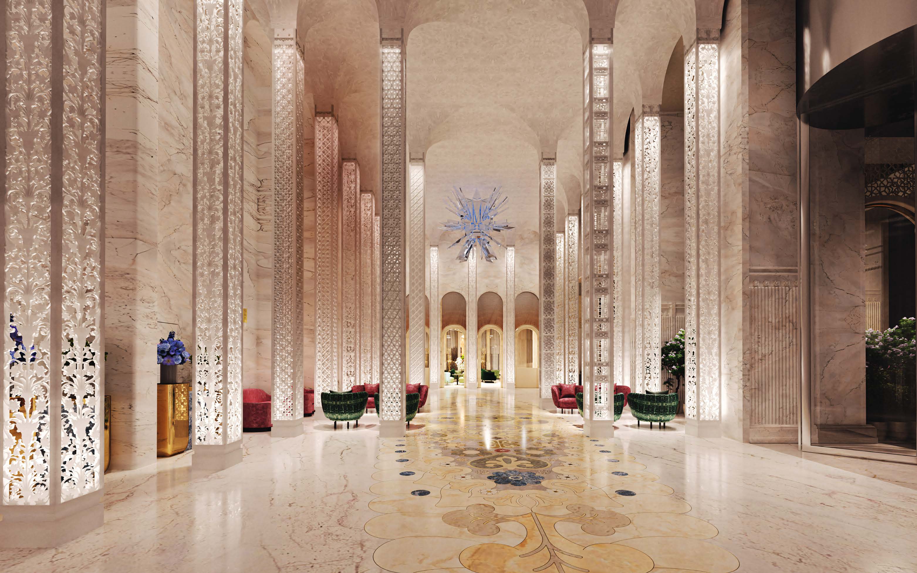 Marble lobby with carved white columns and inlaid floor